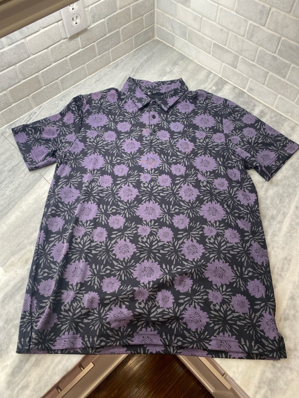 Travis Mathew Black Polo with Purple Floral Print